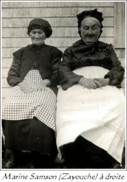 Two seated women in aprons; Marine Samson on the right