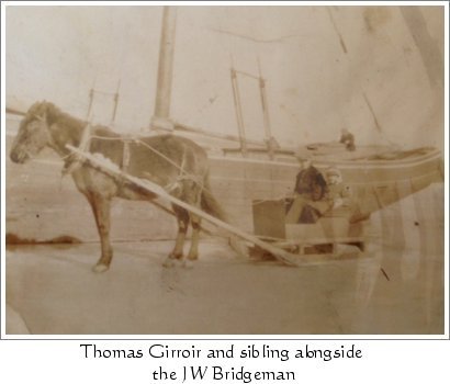Thomas Girroir and sibling alongside the J.W. Bridgeman